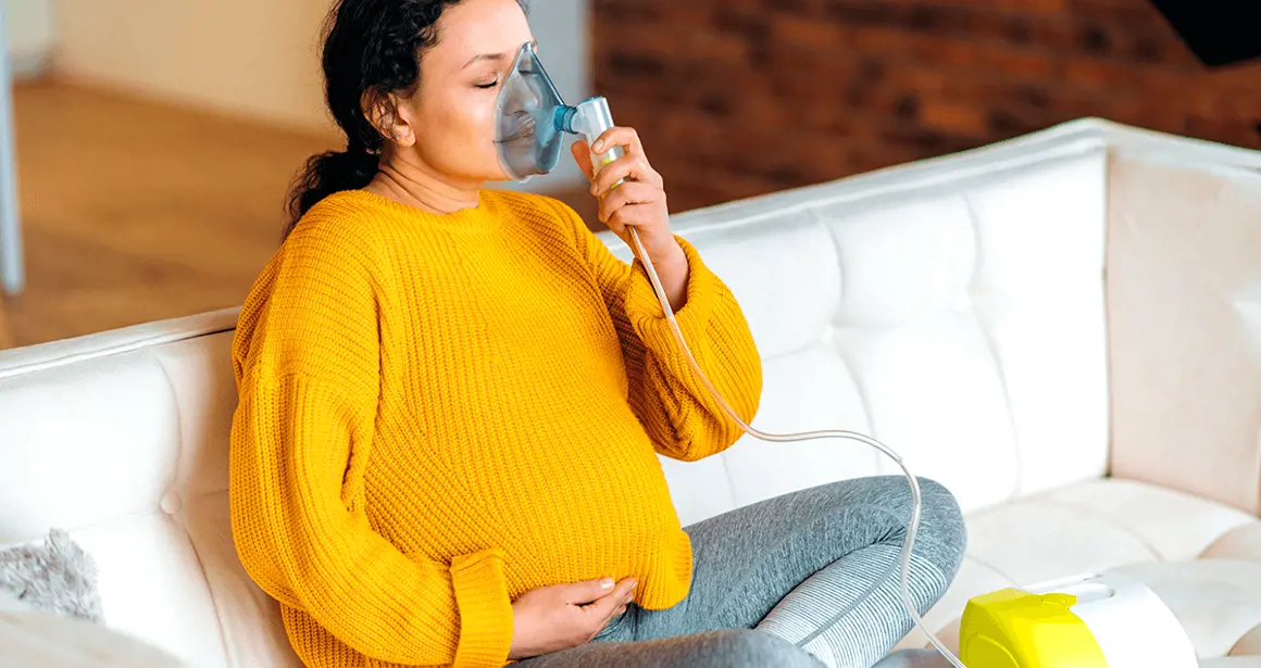 A pregnant woman makes an inhalation