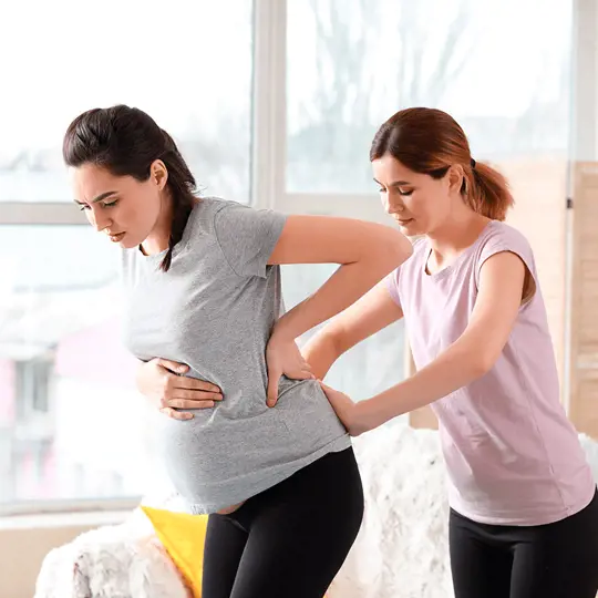 Reflexology treatment for a pregnant woman