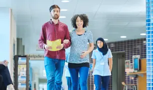 A pregnant woman and her husband are in hospital