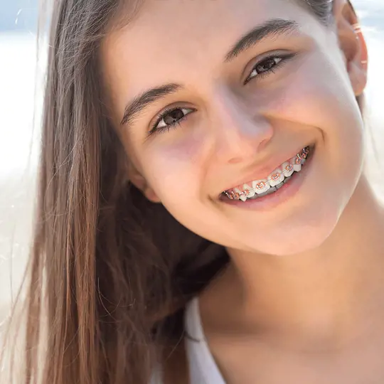 A girl with braces on her teeth