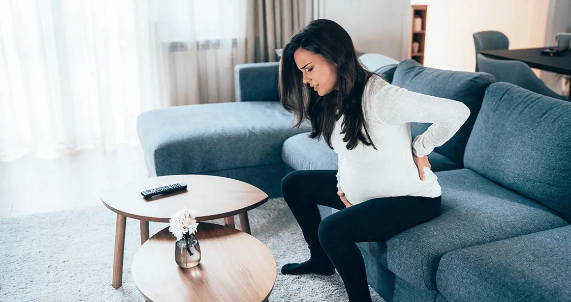 A pregnant woman suffers from back pain