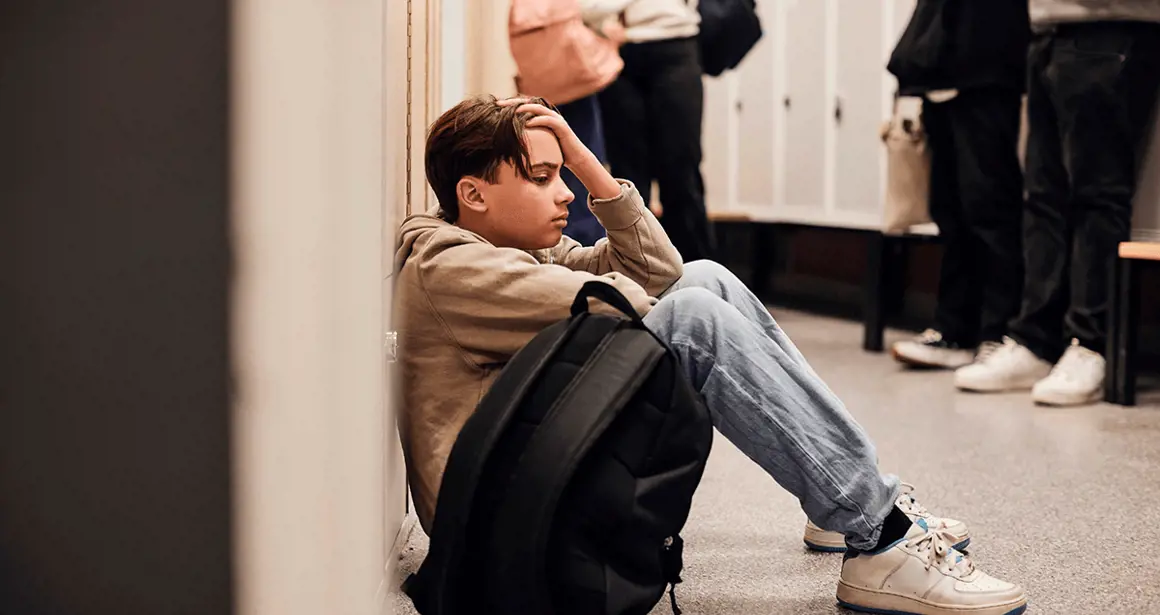 A teenage boy in a poor mental state