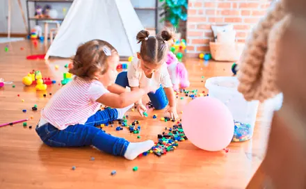 Children play with small parts